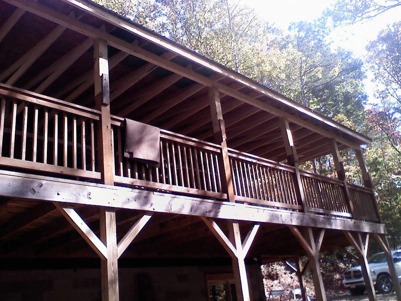 Timber framing under a new elevated porch and deck — Roof Leak Repair in Bonners Ferry by Roofing Brothers